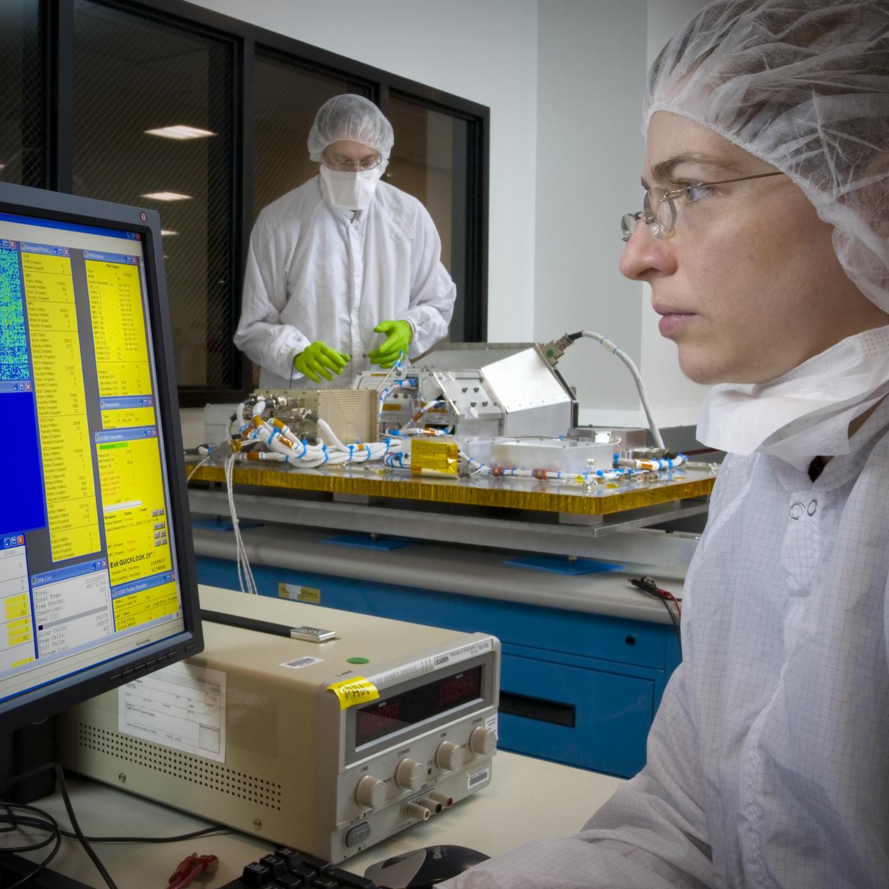 LCROSS leaves Northrup Grumman Redondo Beach, CA clean room post shippment verification tests before being mated to the Lunar Reconnaissance Orbitor (LR0) spacecraft for a piggyback ride to the Moon. With Kim Ennico Ames P.I. and Mark Shirley, Northrup Grumman.