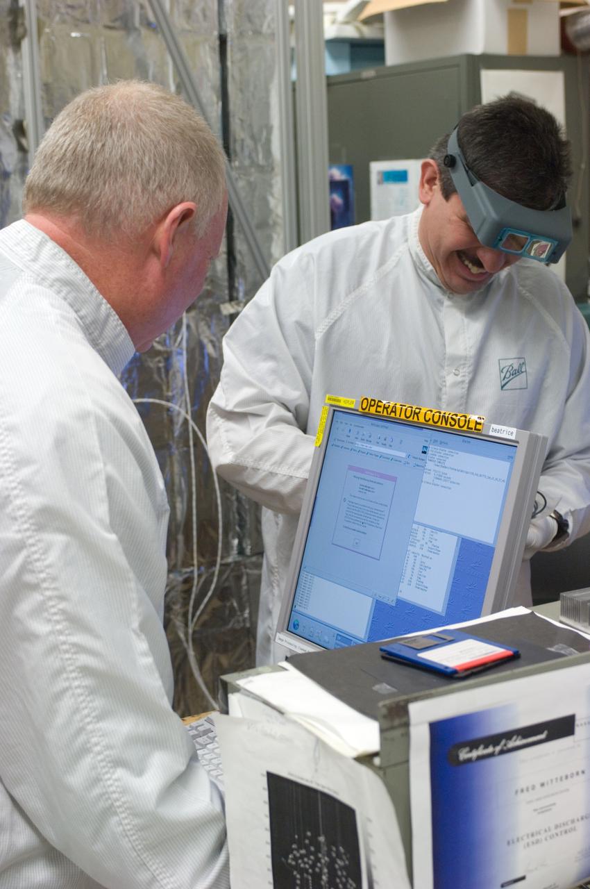 Kepler project; technicians from Ball Aerospace work on  and in the test chamber assembled at Nasa Ames Research center testing components