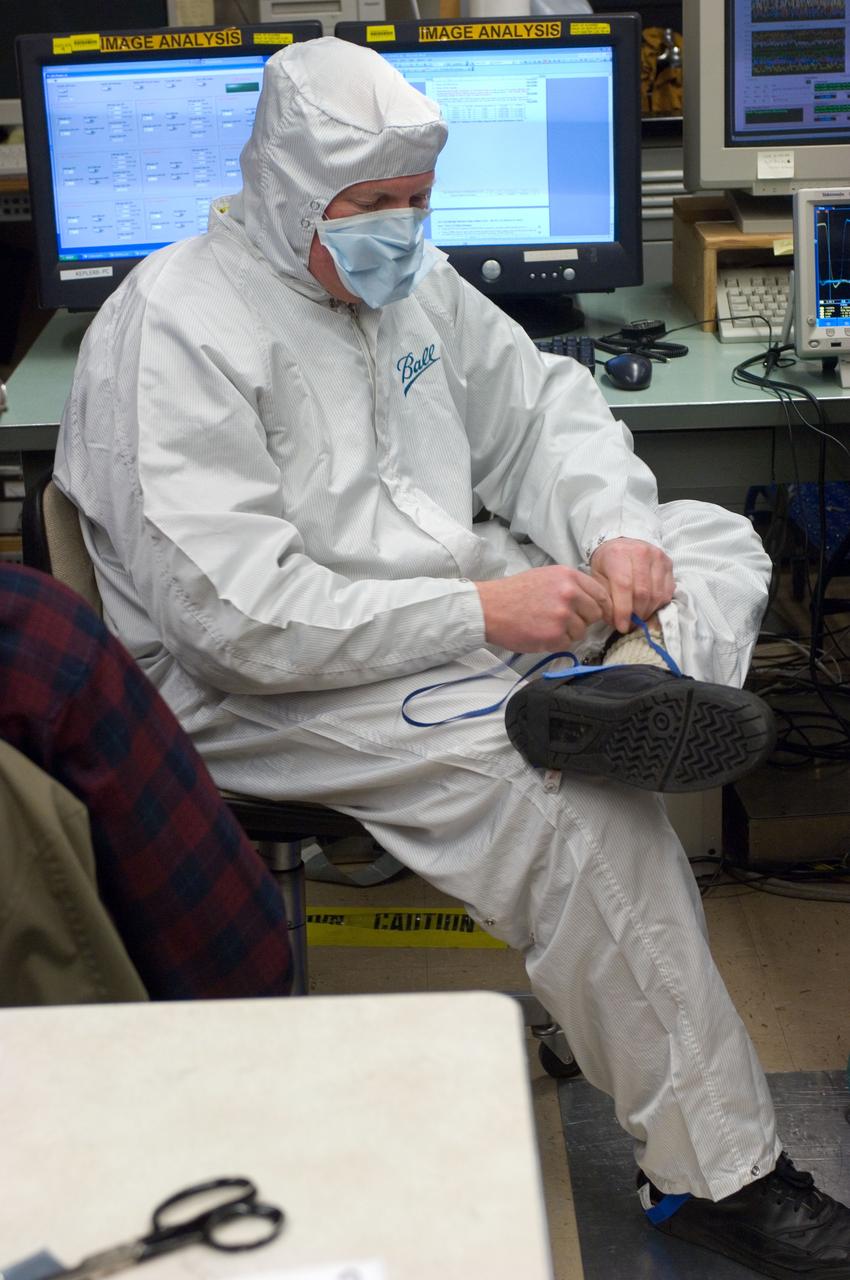 Kepler project; technicians from Ball Aerospace work on  and in the test chamber assembled at Nasa Ames Research center testing components
