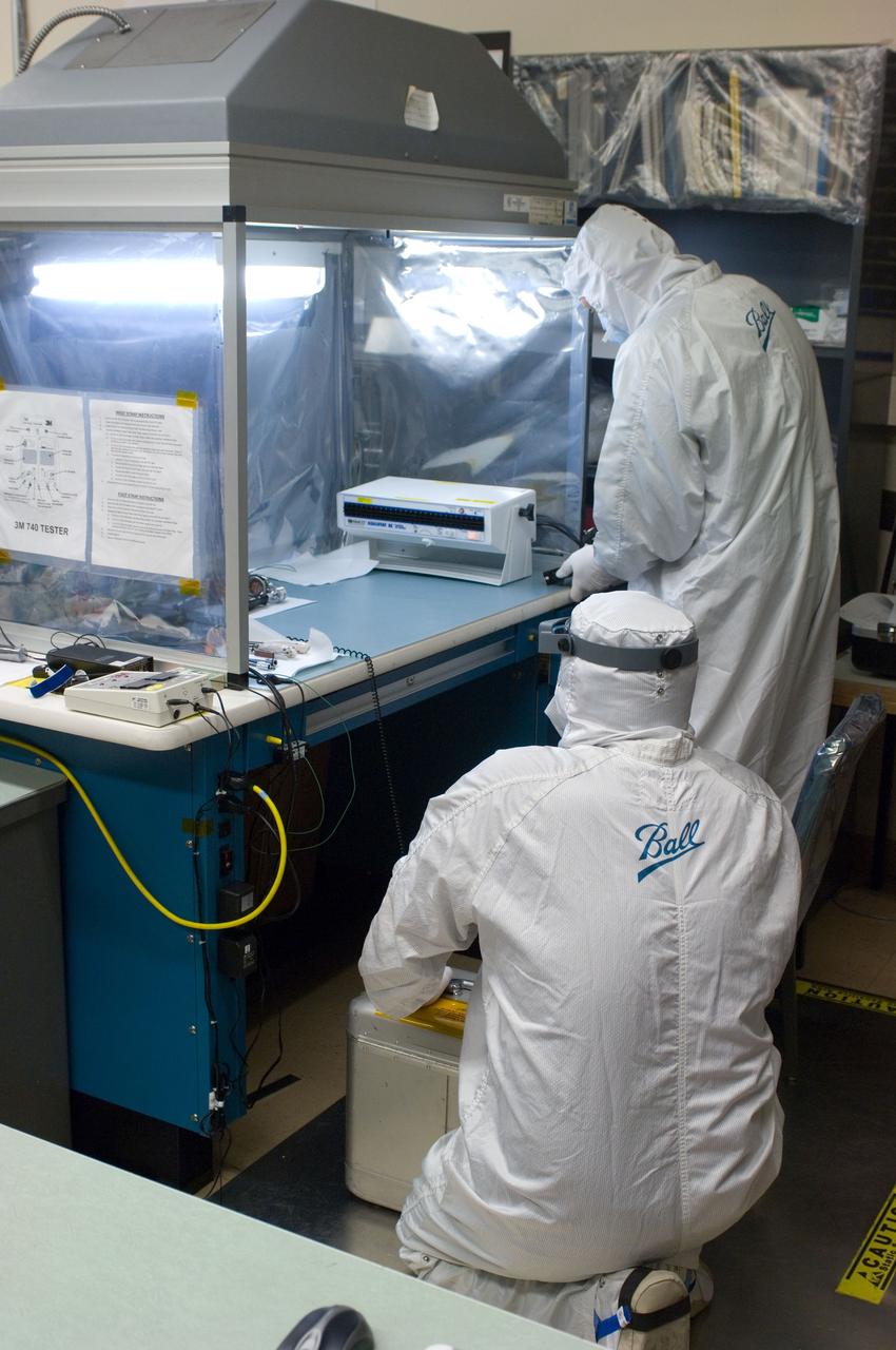 Kepler project; technicians from Ball Aerospace work on  and in the test chamber assembled at Nasa Ames Research center testing components