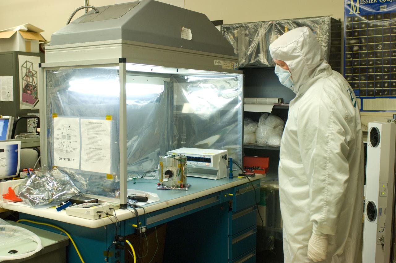 Kepler project; technicians from Ball Aerospace work on  and in the test chamber assembled at Nasa Ames Research center testing components