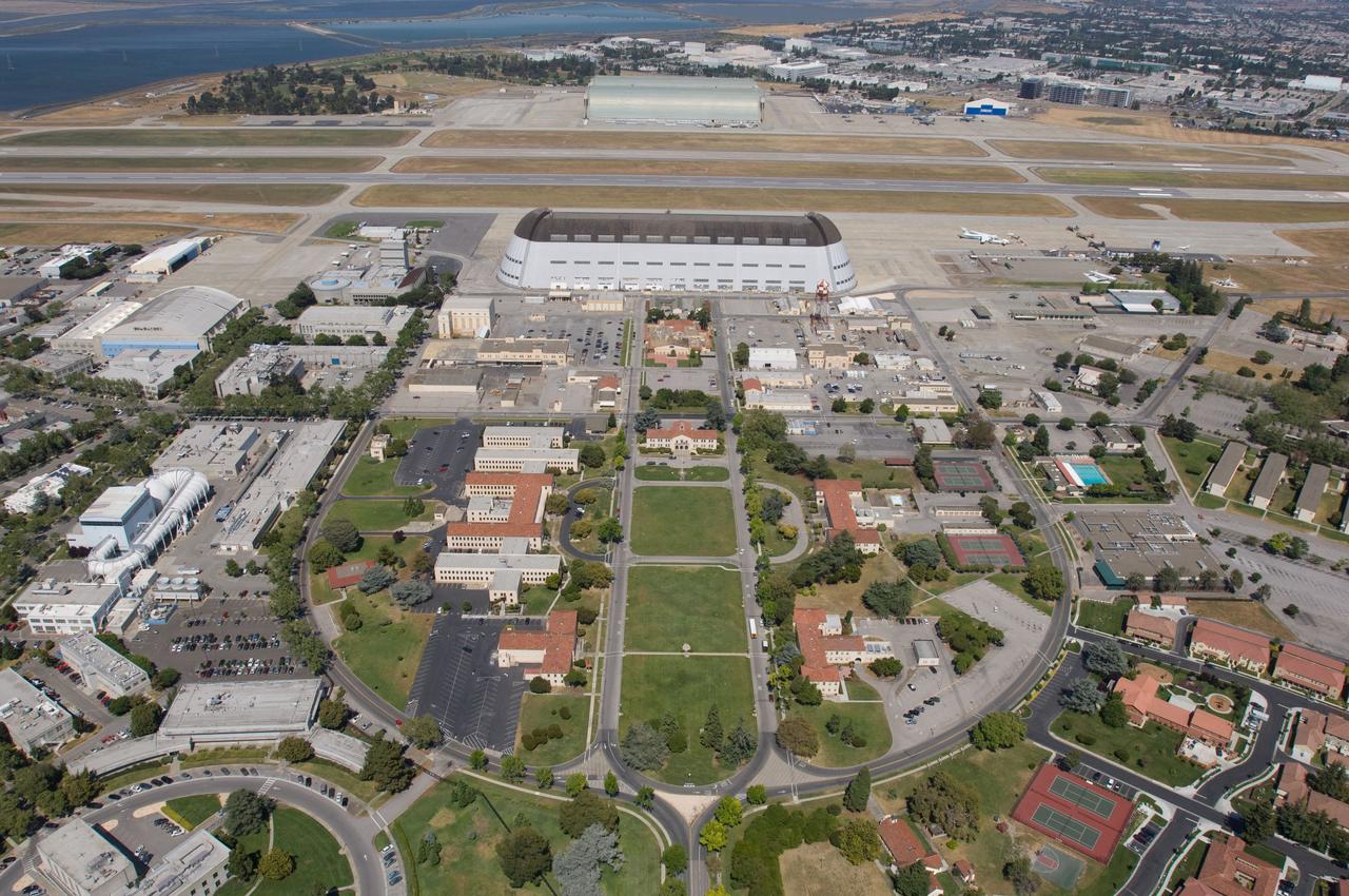 Aerial views of NASA Reserach Park, Moffett Airfield, California showing Shenandoah Parade grounds and Plaza