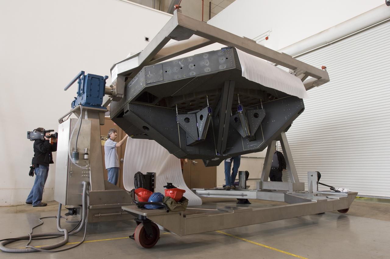 SOFIA (Stratospheric Observatory for Infrared Astronomy) primary mirror being coated in the Ames N-211 Vacuum Chamber.
