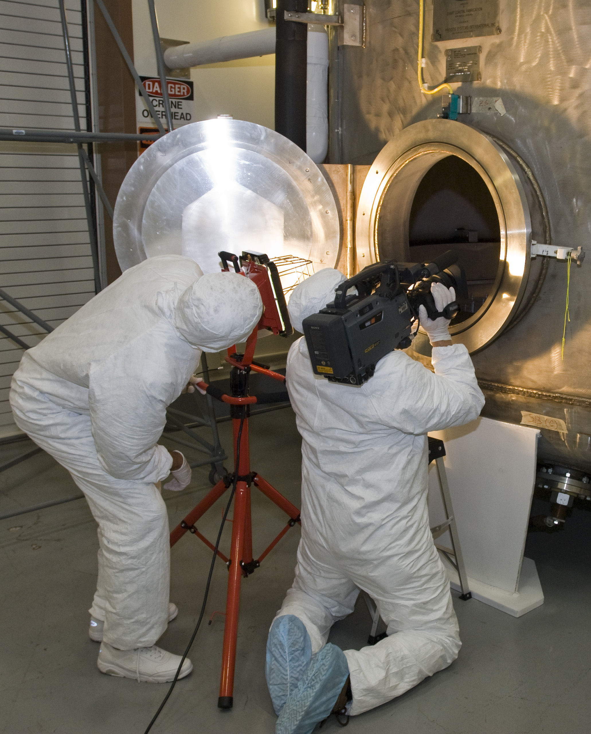 SOFIA (Stratospheric Observatory for Infrared Astronomy) primary mirror being coated in the Ames N-211 Vacuum Chamber.