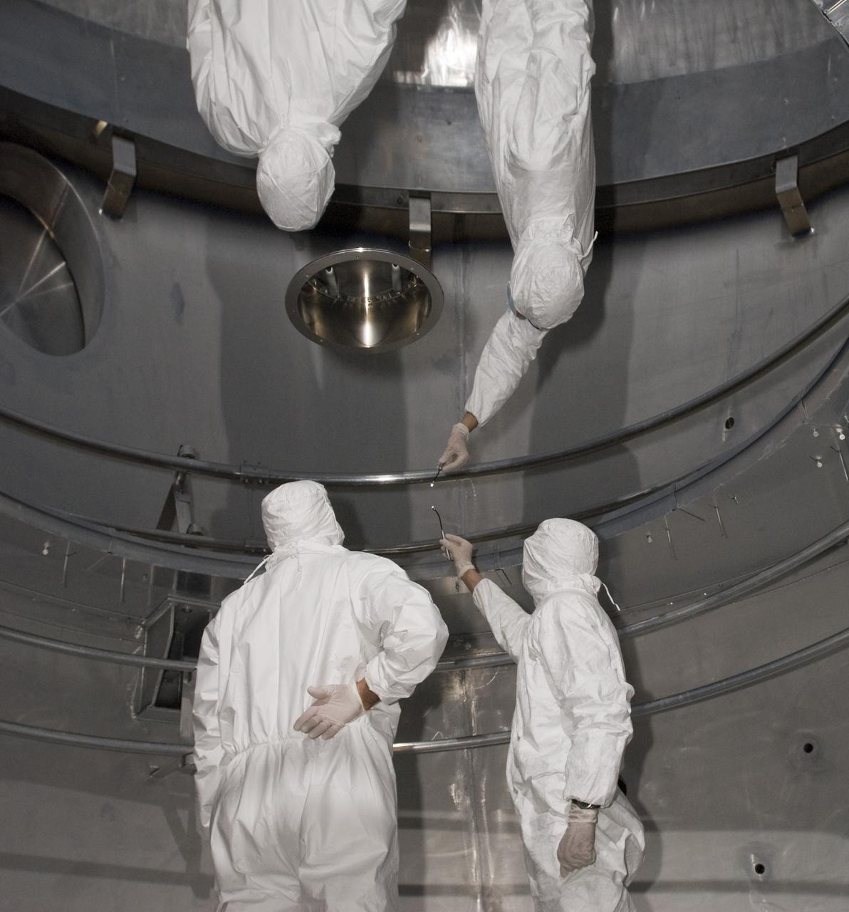 SOFIA (Stratospheric Observatory for Infrared Astronomy) primary mirror being coated in the Ames N-211 Vacuum Chamber.