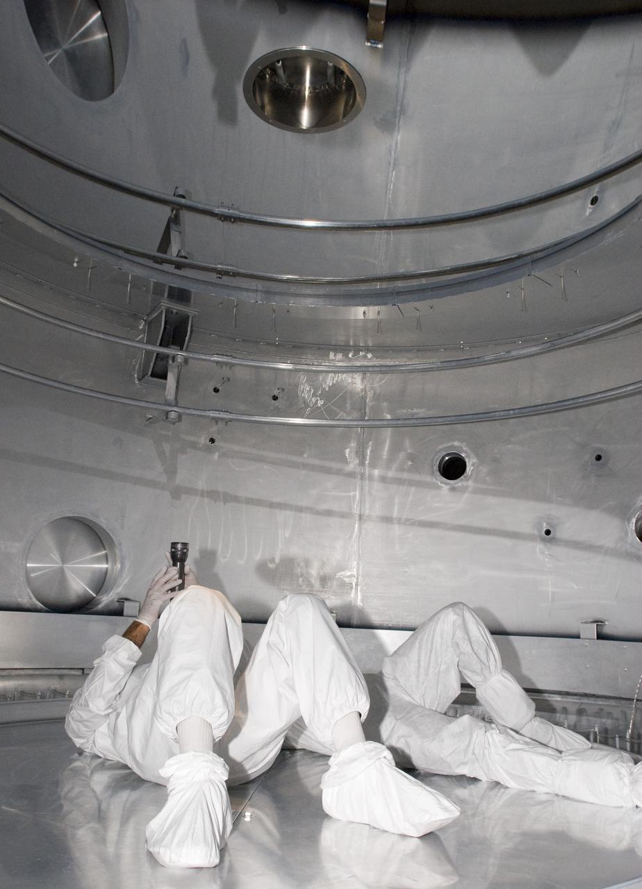 SOFIA (Stratospheric Observatory for Infrared Astronomy) primary mirror being coated in the Ames N-211 Vacuum Chamber.