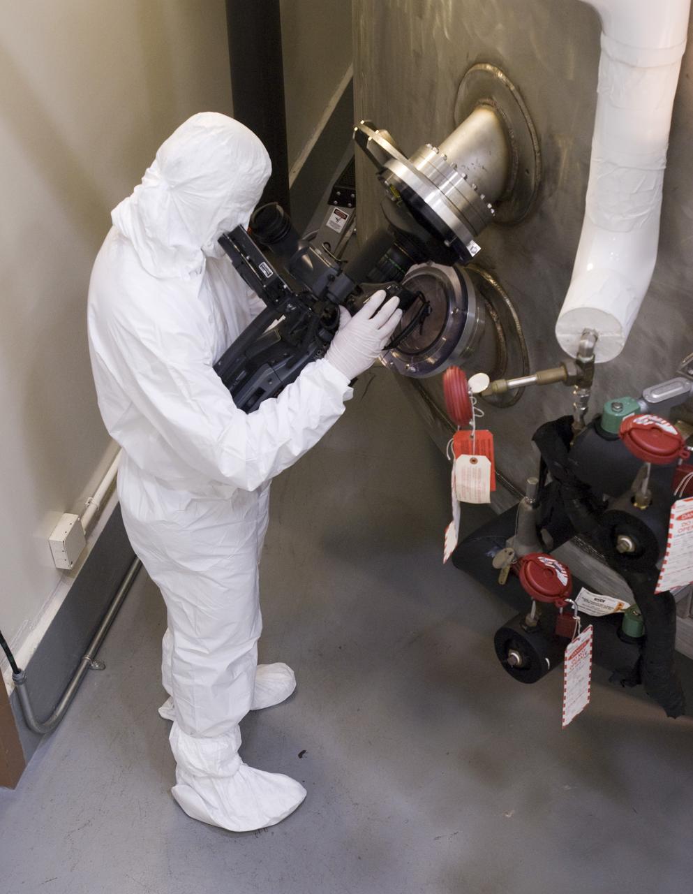 SOFIA (Stratospheric Observatory for Infrared Astronomy) primary mirror being coated in the Ames N-211 Vacuum Chamber.