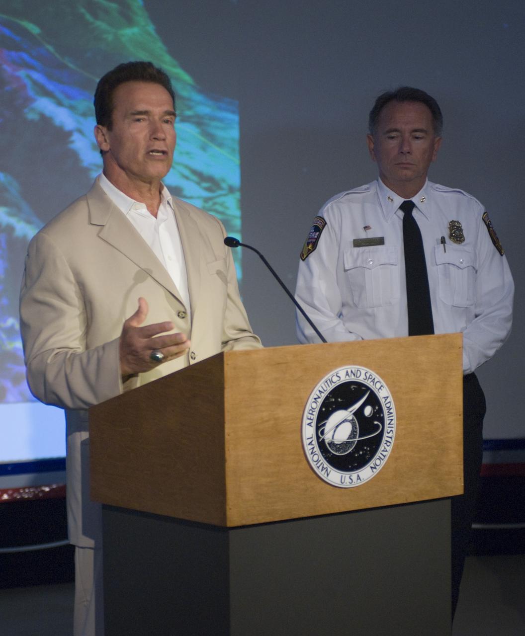 California Governor Arnold Schwarzenegger during a press briefing following a visit to Ames Earth Science Division for a briefing by Steve Hipskind on NASA Ames remote sensing fire fighting efforts.