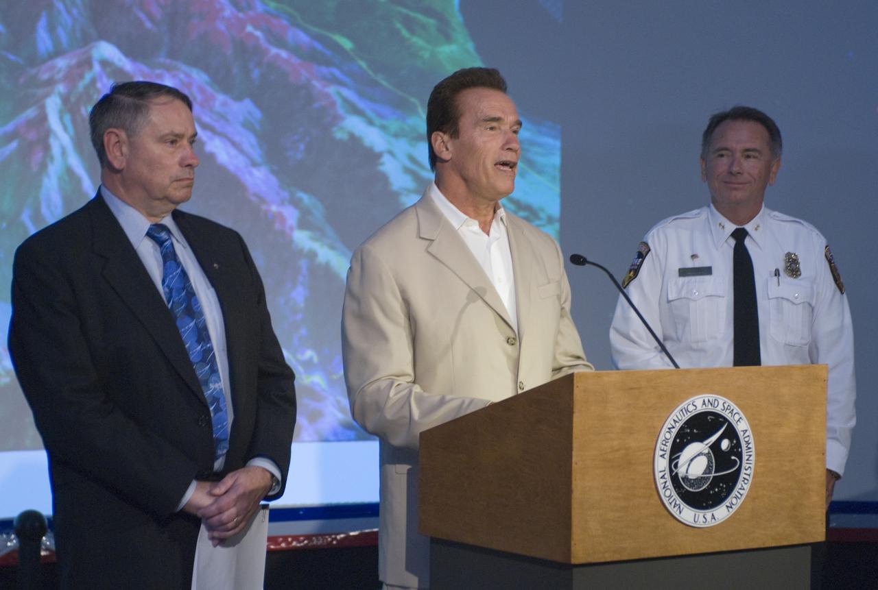 California Governor Arnold Schwarzenegger during a press briefing following a visit to Ames Earth Science Division for a briefing by Steve Hipskind on NASA Ames remote sensing fire fighting efforts.