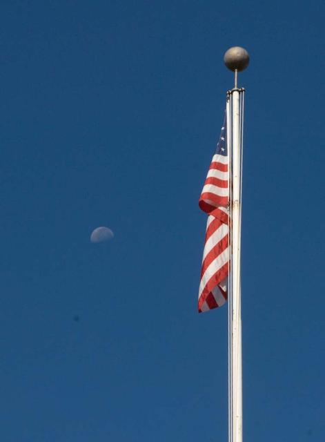 First Lunar Science Institute (LSI) collobration signing with nine (9) International partners. The Moon makes a daylight appearance over the LSI building-17.