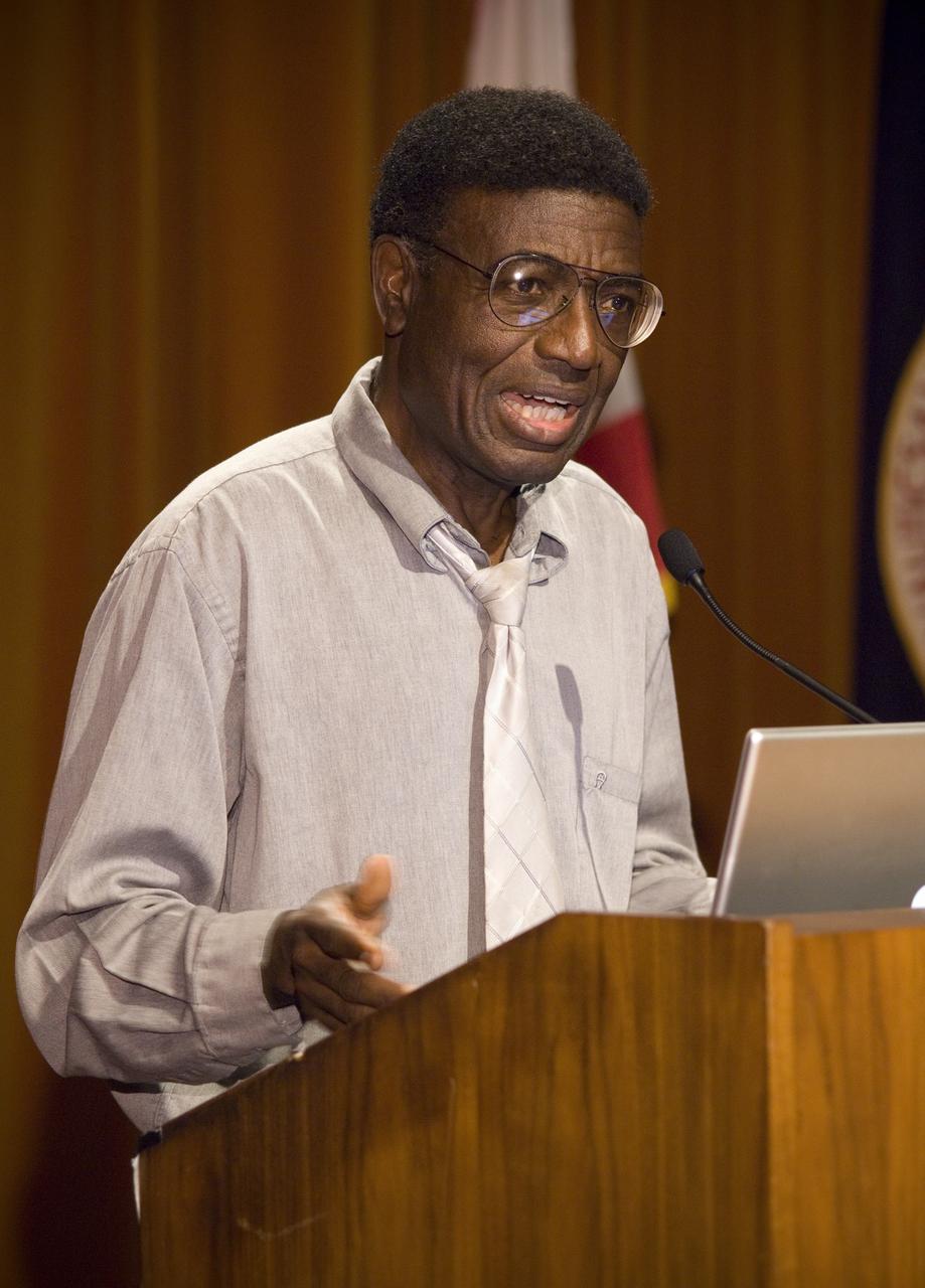 Summer Internship for 2008 closing ceremony: Dr Ben Oni, Higher Education Program Coordinator introduces the Keynote Speaker.