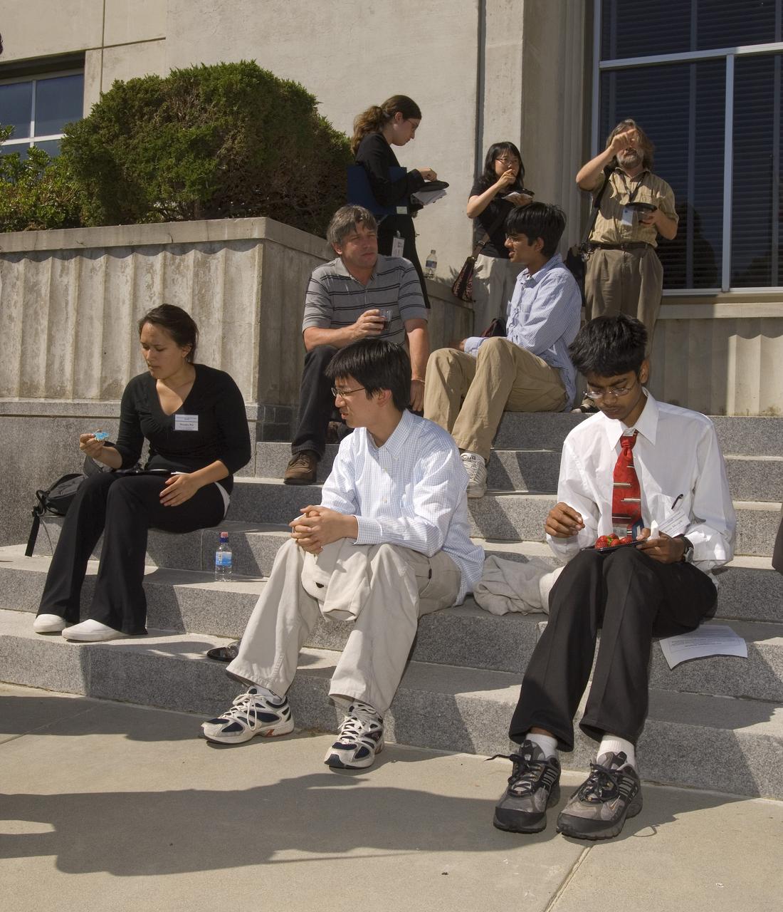 Summer Internship for 2008 closing ceremony; students on steps of the Ames Administration building N-200 enjoying the reception.