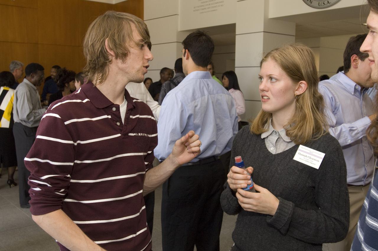 Summer Internship for 2008 closing ceremony  students enjoying the receptionon in lobby of the Ames Administration building N-200.