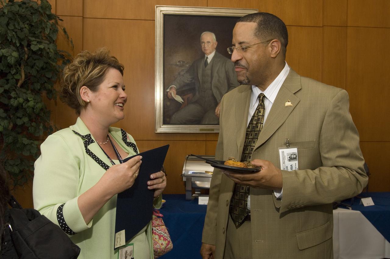 Summer Internship for 2008 closing ceremony  students enjoying the receptionon in lobby of the Ames Administration building N-200.