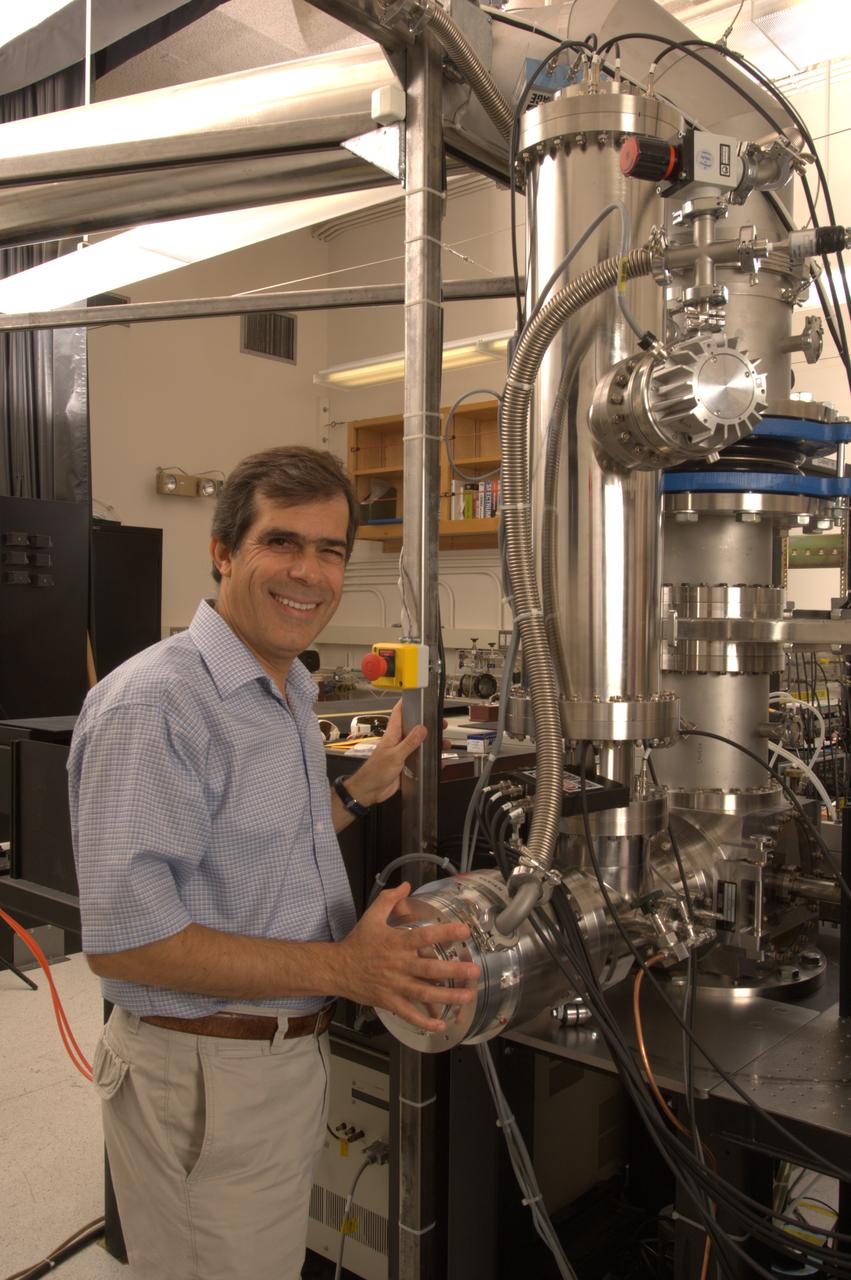 NASA Ames Astrophysics Branch (code-SSA), Pulsed discharge nozzle - Cavity Ring down - Reflection Time of Flight Mass Spectrometer (N-245 rm B-31) (PDN-CRDS-RETOFMS) shown here with Farid Salama