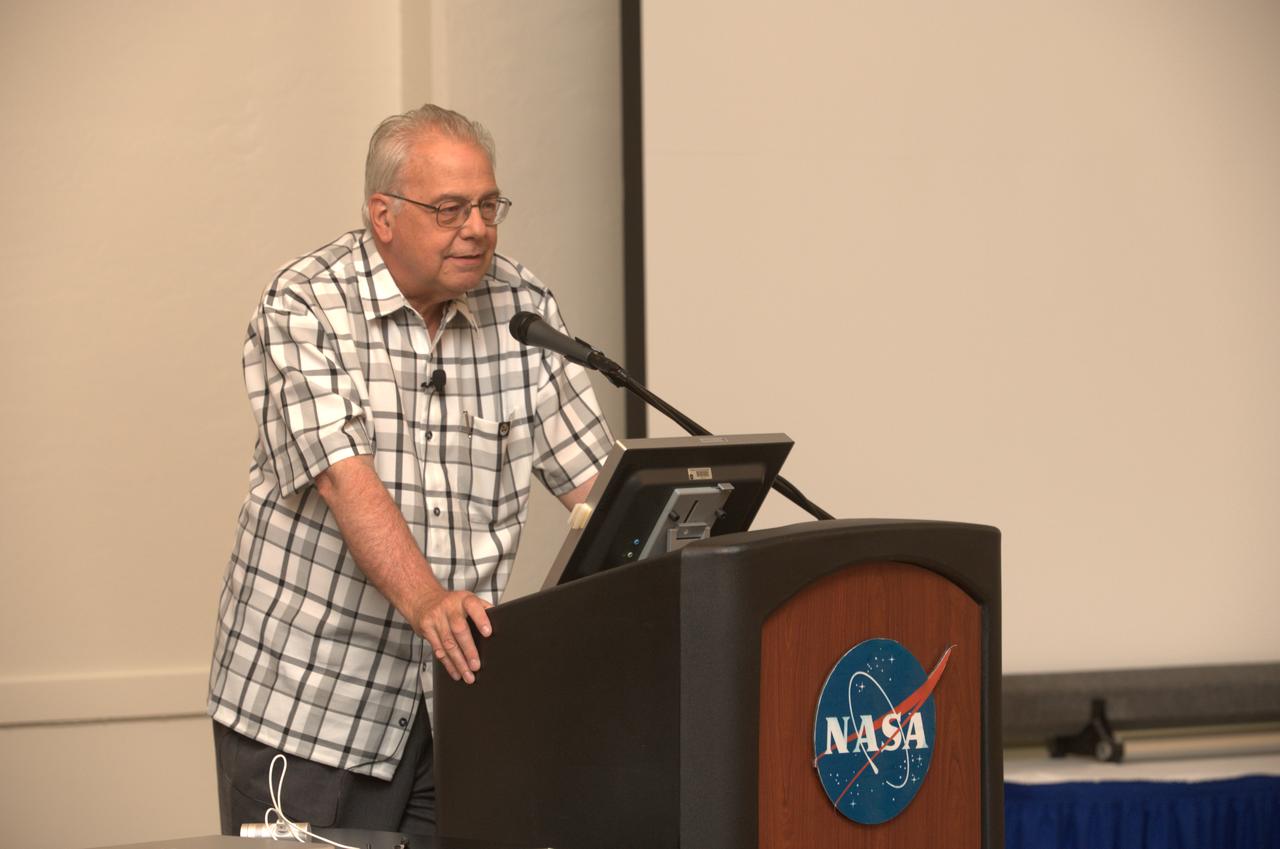 LCROSS Family night at Ames. Dr. David Morrison Interim Director of the Lunar Science Institute at Ames addresses the crown.