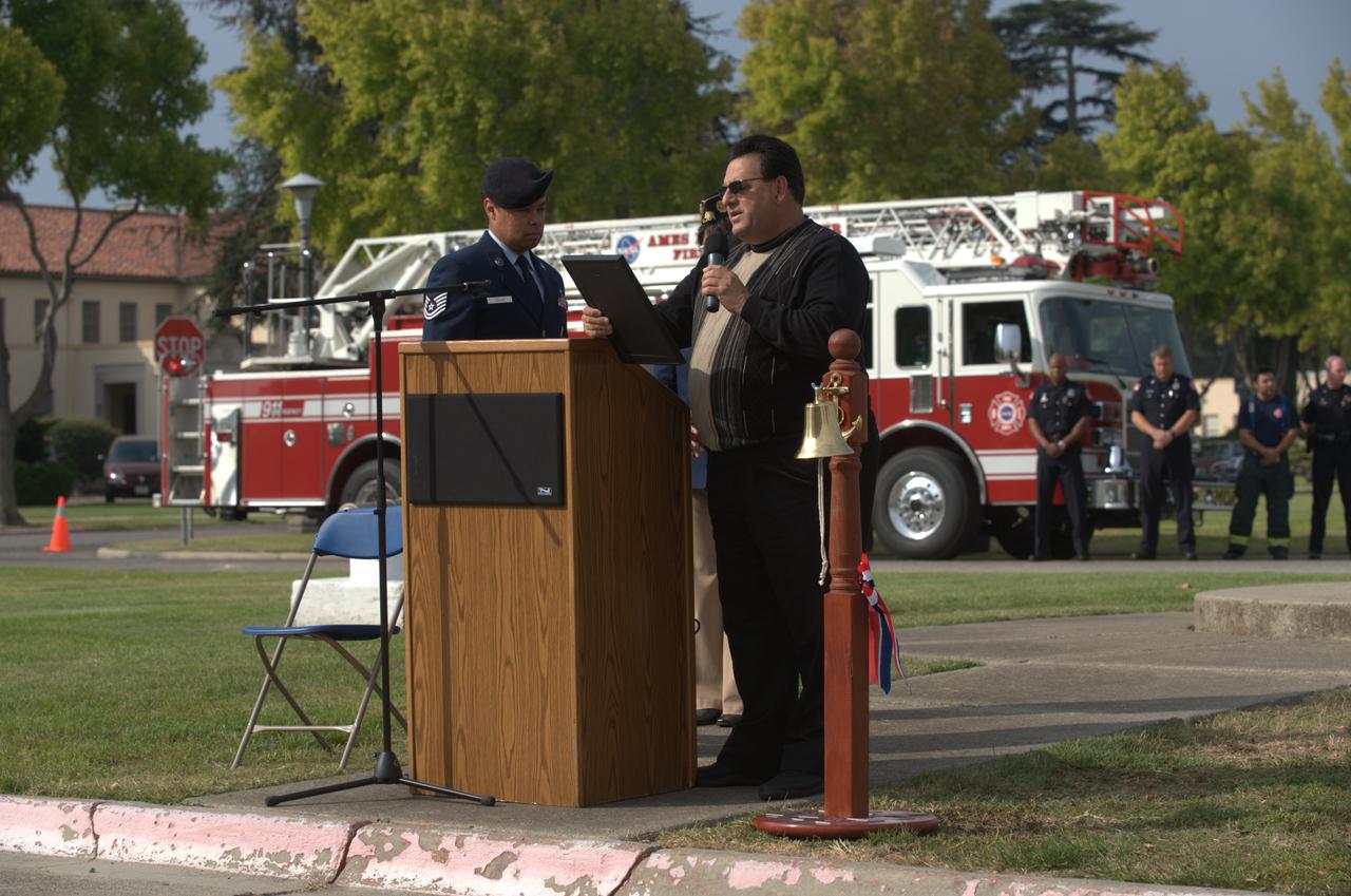 September 11th remembrance ceremony held in front of NASA Research Park Bldg-17 (Lunar Science Institute) hosted by the American Legion, Post 881, Moffett Field.  Mt View Mayor Tom Means presents Patriot Day Proclamation