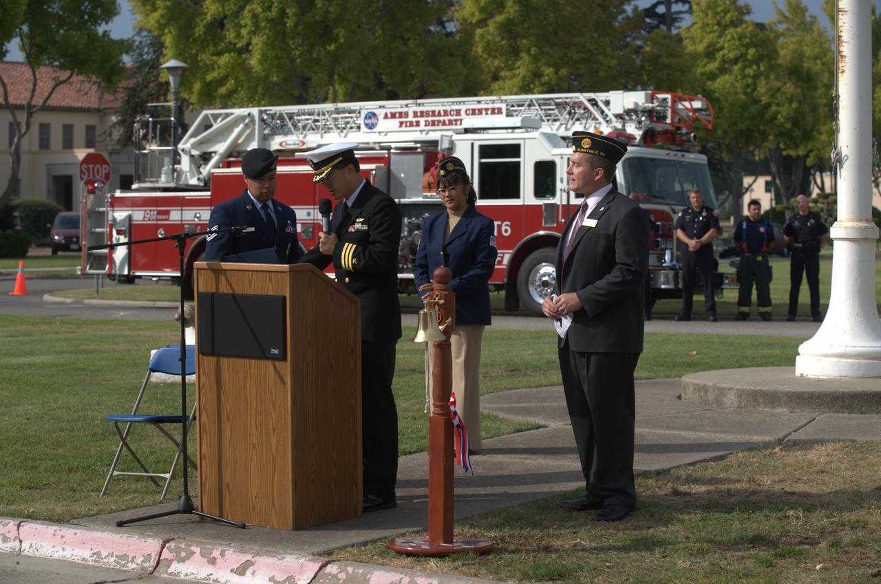 September 11th remembrance ceremony held in front of NASA Research Park Bldg-17 (Lunar Science Institute) hosted by the American Legion, Post 881, Moffett Field. City of Sunnyvale council members - Otto Lee and David Whittum presents Cerificate of Commendation