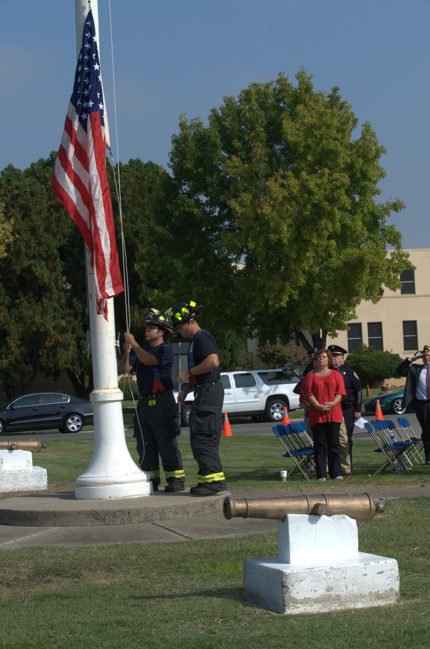 September 11th remembrance ceremony held in front of NASA Research Park Bldg-17 (Lunar Science Institute) hosted by the American Legion, Post 881, Moffett Field.  Flag detail - Lt Randy Vincent - NASA Protective Services, Ty Locatelli,  Carlos Pinedo  - NASA Fire Department