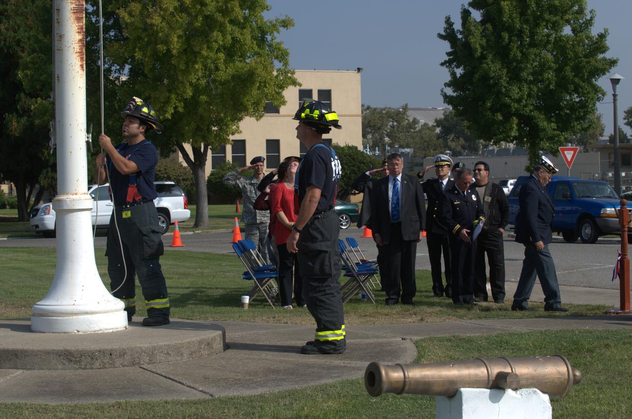 September 11th remembrance ceremony held in front of NASA Research Park Bldg-17 (Lunar Science Institute) hosted by the American Legion, Post 881, Moffett Field.  Flag detail - Lt Randy Vincent - NASA Protective Services, Ty Locatelli,  Carlos Pinedo  - NASA Fire Department