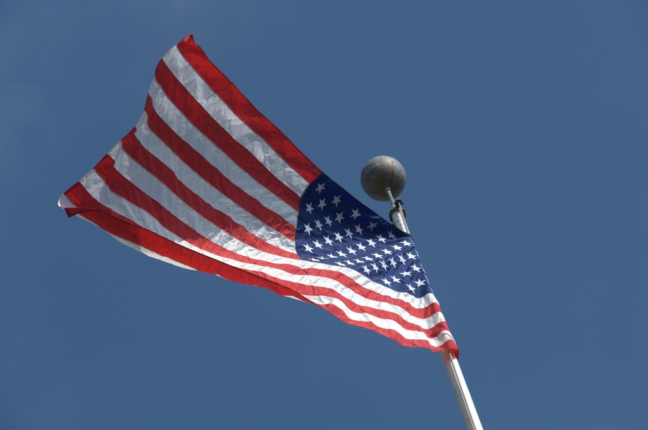 September 11th remembrance ceremony held in front of NASA Research Park Bldg-17 (Lunar Science Institute) hosted by the American Legion, Post 881, Moffett Field.  Flag detail - Lt Randy Vincent - NASA Protective Services, Ty Locatelli,  Carlos Pinedo  - NASA Fire Department