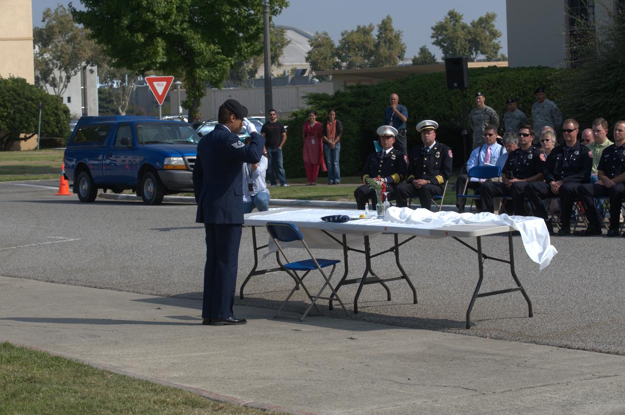 September 11th remembrance ceremony held in front of NASA Research Park Bldg-17 (Lunar Science Institute) hosted by the American Legion, Post 881, Moffett Field. Step off to Amazing Grace - POW/MIA Detail; TSgt Robert Soua, Detail Commander, 129th Security Forces, TSgt Rachel Velasco, SSgt Susan Avalos, SSgt Alex Cohen, SSgt Elias Gonzalez