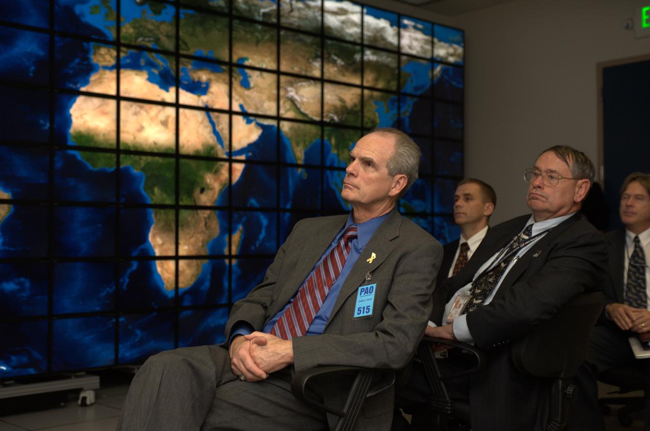 San Jose Mayor Chuck Reed recently met with Ames Center Director S. Pete Worden and also took a quick tour of the Osmotic Lab and hyperwall-2 at Ames. Reed is seen here (sitting, right) at the hyperwall-2 with Steve Hipskind, Chief, NASA’s Earth Science Division (left). and Ames Center Director Pete Worden behind Reed.