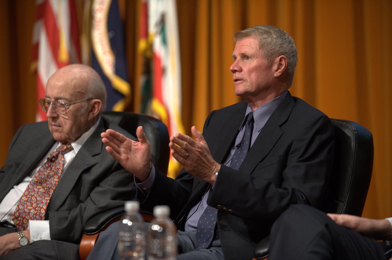 NASA's 50th Anniversay year. Panel discussion with four of NASA AMES's past center directors on how their tenure effected Ames and NASA. On the  projects they pushed for and/or pushed forward and the culture of the center and the agency and  how that worked for or against Ames, as well as major contributions of the time made by Ames Research Center.  Panel L-R; Hans Mark, Sy Syvertson, Dale Compton, Scott Hubbard and Pete Worden, present director. (Past Directors served for periods from 1969 thru 2006)  Dale Compton speaking.