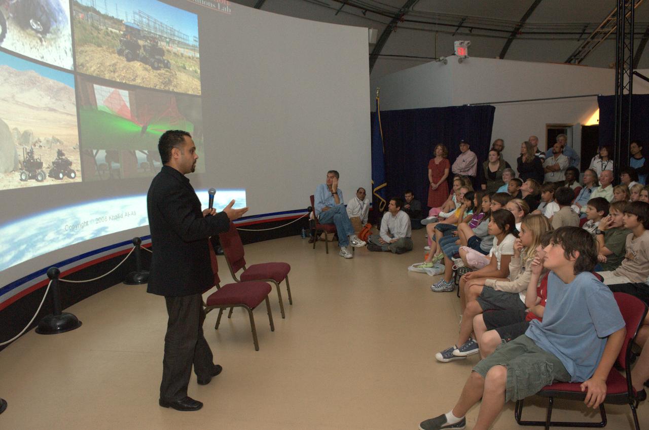 Tech Talk on Extreme Rovers: Unveiling the latest findings of Robotic Exploration of Extreme Environments shown in the Immersve Theater NASA Ames Exploration Center Bldg 943A  KbalidAl-Ali CMU - West gives presentation on 'Practical Rover Technology'