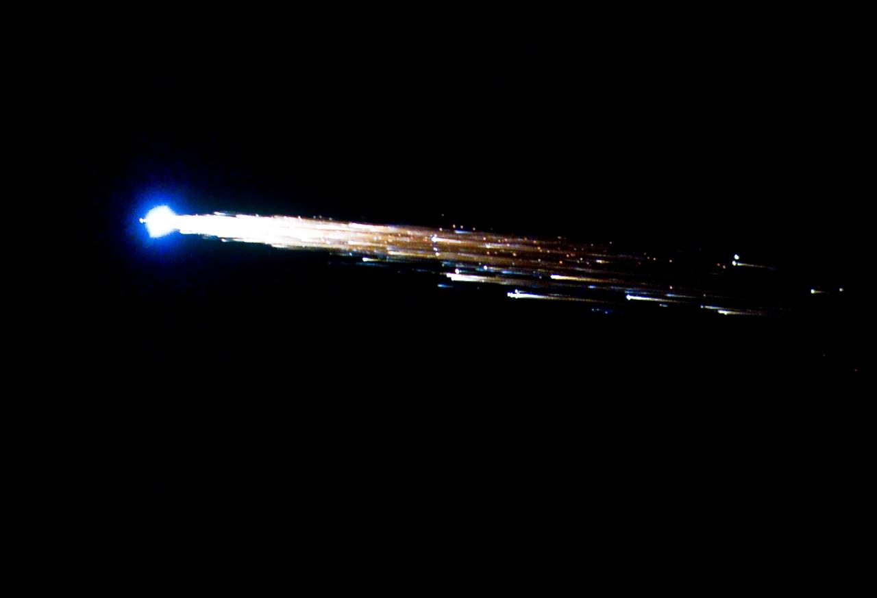 European Space Agency's 'Jules Verne' Automated Transfer Vehicle ATV-1 re-entry in Earth's atmosphere over Pacific Ocean.  The breakup ad fragmentation of the ESA's ATV-1 was captured in dramatic fashion by scientists aboard NASA's DC-8 airborne laboratory and a Gulfstream V aircraft as it re-entered the atmosphere early Monday morning over the South Pacific.  Photo Credit: NASA Ames Research Center/ESA/Jesse Carpenter/Bill Moede