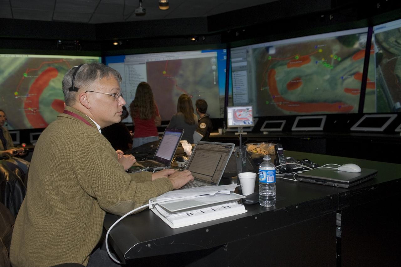 K-10 (red) plaentary rover at Marscape (Ames Mars Yard): with prototype flight control team remotely operating K-10 'Red' from  Ames Future Flight Centeral (FFC) Simulator. With Rob Landis