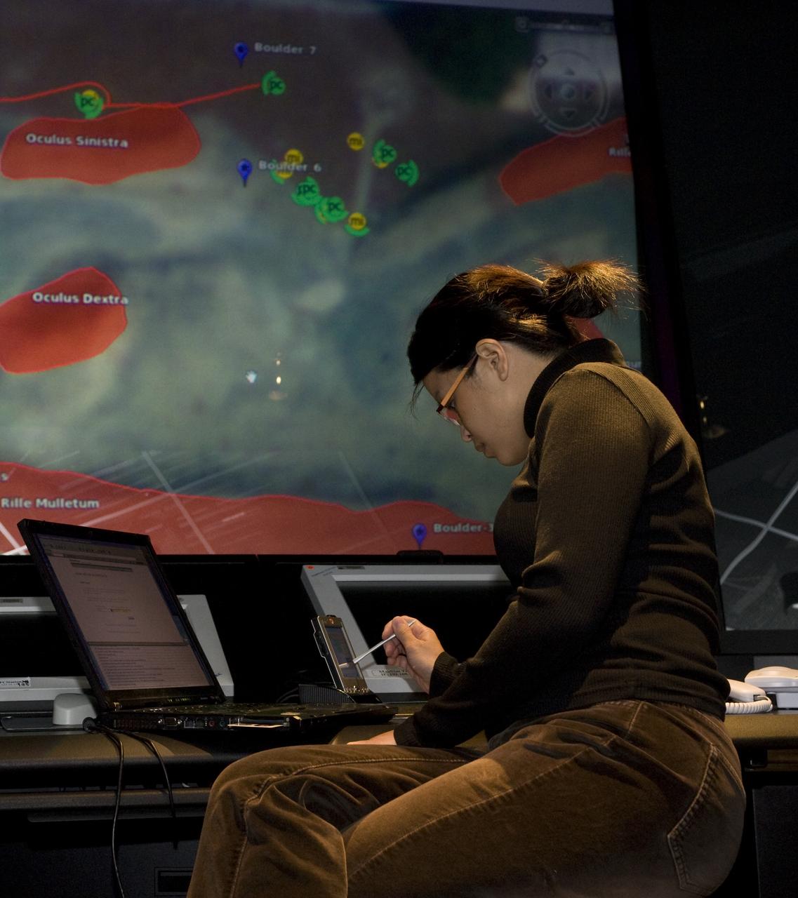 K-10 (red) plaentary rover at Marscape (Ames Mars Yard): with prototype flight control team remotely operating K-10 'Red' from  Ames Future Flight Centeral (FFC) Simulator, with Estrellina Pacis.