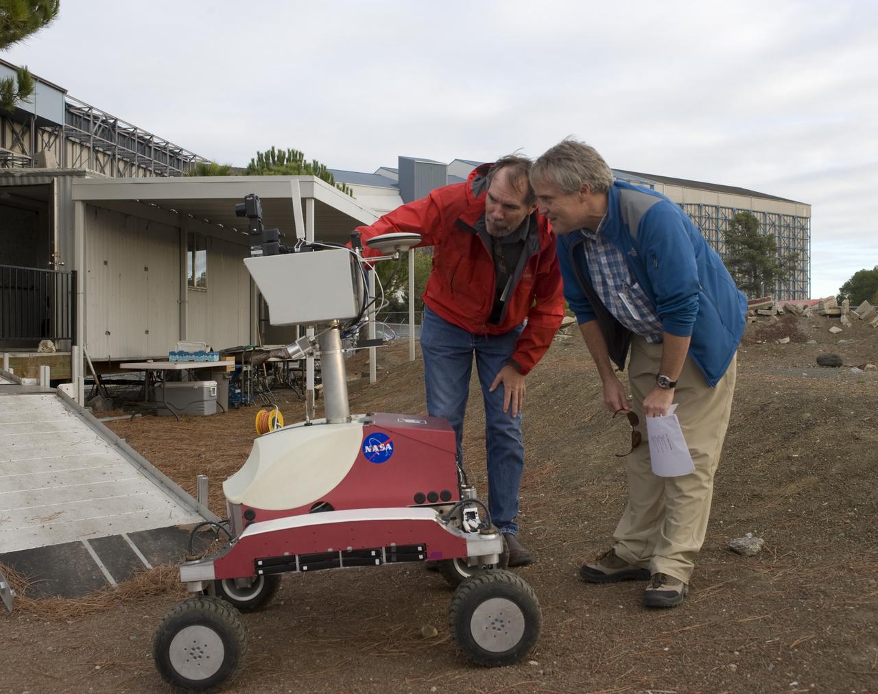 K-10 (red) robot operations tests at Marscape (Ames Mars Yard) with remote operations from Ames Future Flight Centeral (FFC) Simulator, with Mark Helper and Kip Hodges.