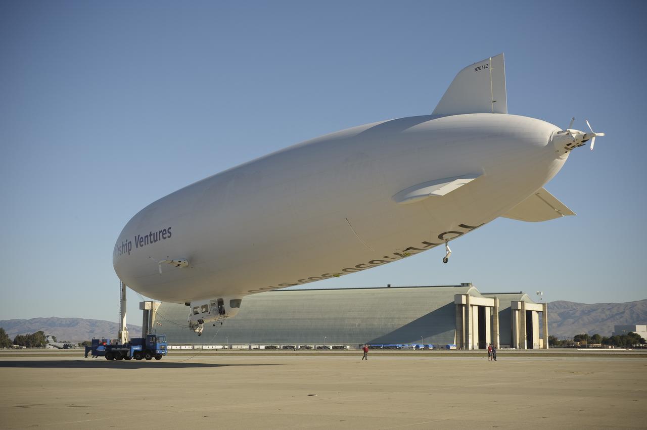 NRP partnerships: Airship Ventures Zeppelin Dedication ceremony at Moffett Field Flight Line, Moffett Field, CA he Airship Ventures 246-foot long Zeppelin Eureka and hangars two and three at MFA in background.