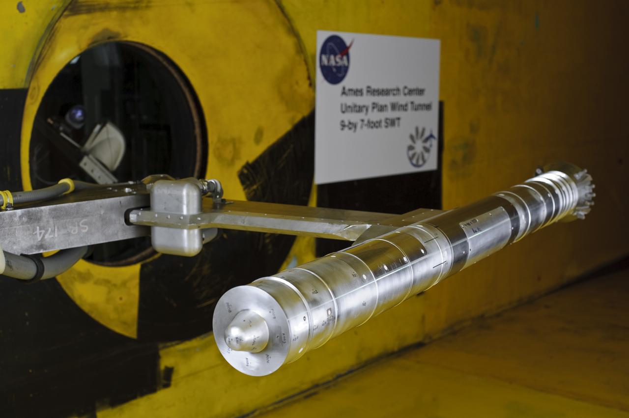2.8% Ares I Acoustic Reentry Wind Tunnel Model in Ames 9X7ft Supersonic Wind Tunnel test-97-0193; model flying backwards in tunnel