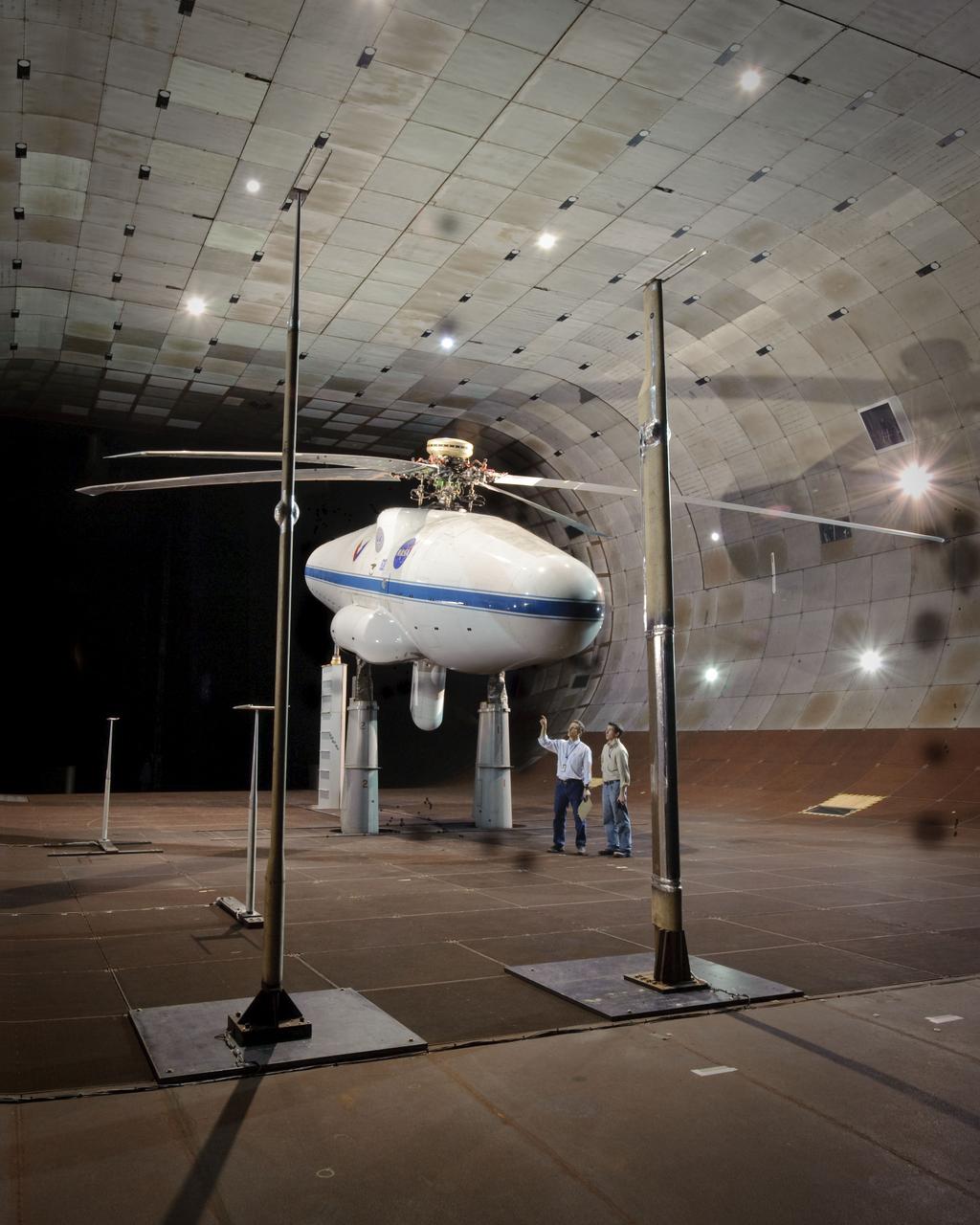 NASA Army UH-60 individual Blade Control (IBC) test-006 in the Ames 40x80Ft Subsonic Wind Tunnel (model configuration and microphone stands)  Jeff Johnson (L) and Justin McLellan (R)
