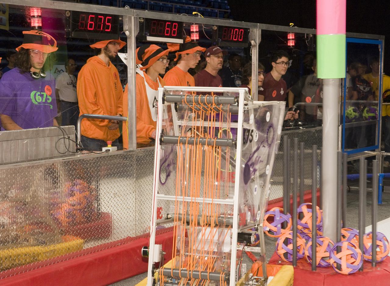 FIRST Robotics Competition  'Lunacy'  hosted by NASA at San Jose State University Event Center. For Inspiration and Recognition of Science and Technology let the games begin. Phantom Robotics team #675, The Wildhats team #100 and Highrollers team #987