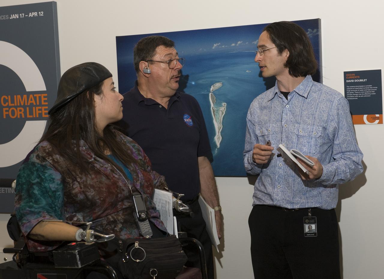 Yuri's Night 2009 held at the California Acaemy of Sciences in San Francisco, California Ames's Dana Bolles and Davis Morse speak with a news person)