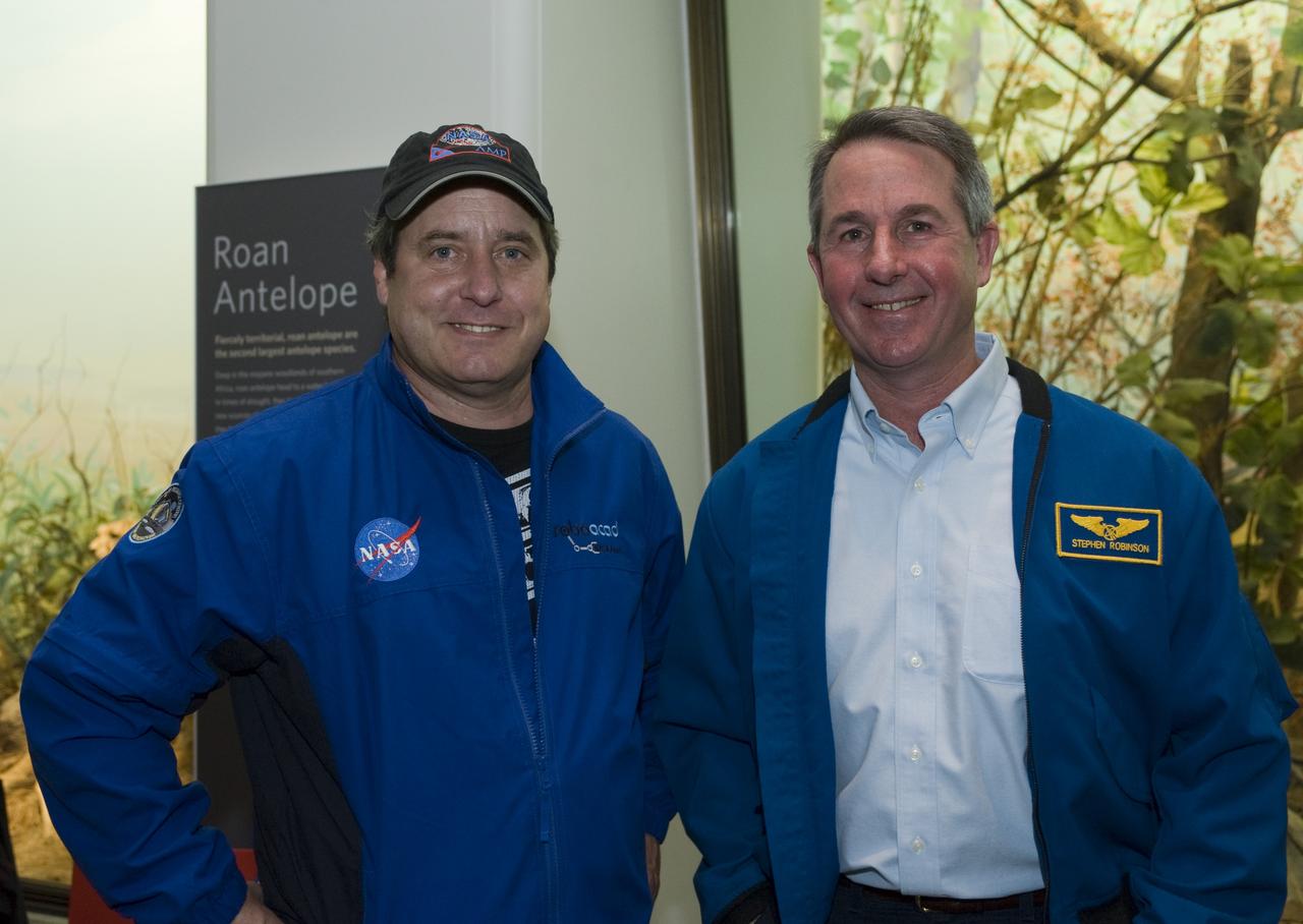 Yuri's Night 2009 held at the California Acaemy of Sciences in San Francisco, California Left, Mark Leon, Ames Robotic Alliance Project Manager and right, NASA Astronaut Stephen Robinson.