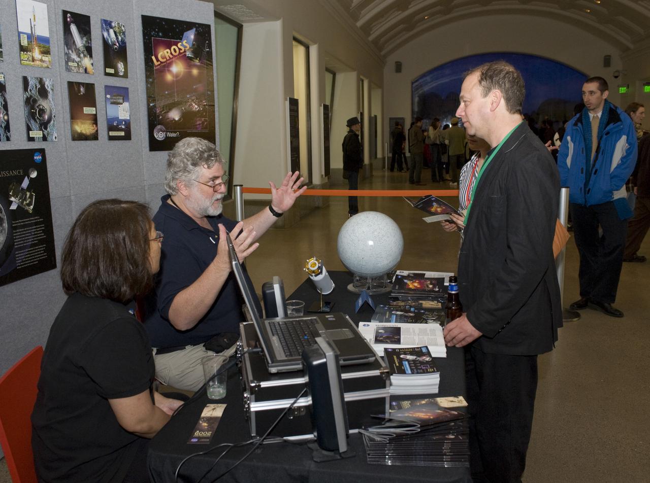 Yuri's Night 2009 held at the California Acaemy of Sciences in San Francisco, California Brian Day, Planners mans the LCROSS booth.