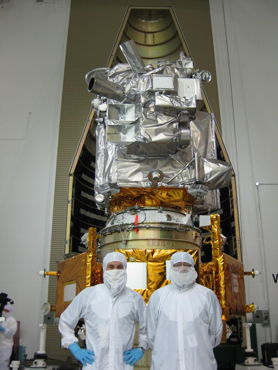Dan Andrews, Project Manager LCROSS and Craig Tooley, Project Manager LRO (Lunar Reconnaissance Orbiter) in front of Spacecraft at the Astrotech facility titusville, FL during LRO/LCROSS media photo op event. The LCROSS mission's objective is to confirm the presence or absence of water ice in a permanently shadowed crater at the moon's South Pole.  (Photo by Jonis Dino AMES PAO, premission for use granted by Dan Andrews, image owner)