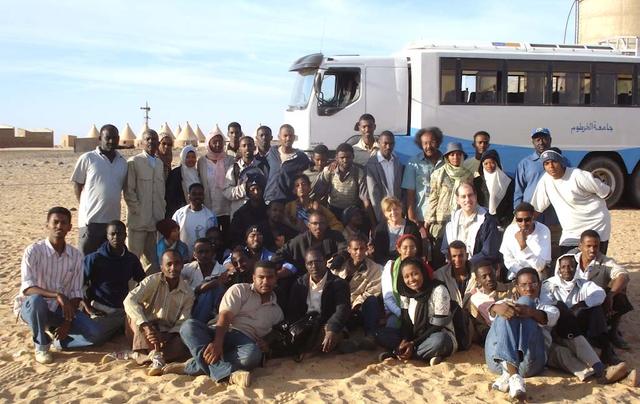 An SUV-sized Asteroid 2008TC# Impacts on October 7, 2008 in the Nubian Desert, Northern Sudan: Dr. Peter Jenniskens, NASA/SETI joined Muawia Shaddas of the University of Khartoum in leading an expedition on a search for samples. (group photo) Photo Credit: NASA/SETI/P. Jenniskens