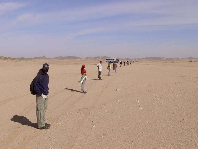 An SUV-sized Asteroid 2008TC# Impacts on October 7, 2008 in the Nubian Desert, Northern Sudan: Dr. Peter Jenniskens, NASA/SETI joined Muawia Shaddas of the University of Khartoum in leading an expedition on a search for samples. (line 3rd day) Photo Credit: NASA/SETI/P. Jenniskens