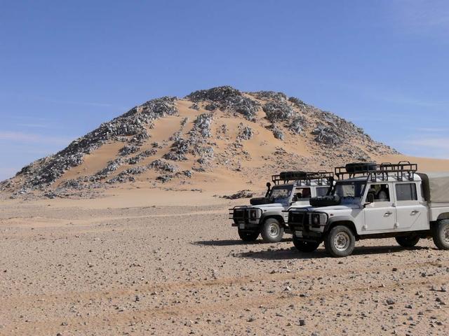 An SUV-sized Asteroid 2008TC# Impacts on October 7, 2008 in the Nubian Desert, Northern Sudan: Dr. Peter Jenniskens, NASA/SETI joined Muawia Shaddas of the University of Khartoum in leading an expedition on a search for samples. (Marble Mountain) Photo Credit: NASA/SETI/P. Jenniskens