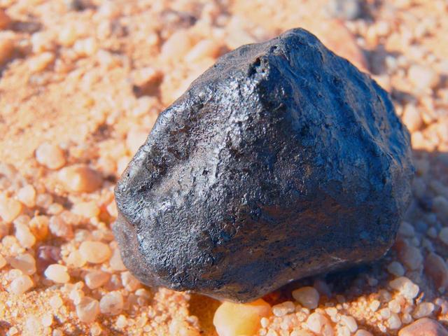 An SUV-sized Asteroid 2008TC# Impacts on October 7, 2008 in the Nubian Desert, Northern Sudan: Dr. Peter Jenniskens, NASA/SETI joined Muawia Shaddas of the University of Khartoum in leading an expedition on a search for samples.  (meteorite)  Photo Credit: NASA/SETI/P. Jenniskens