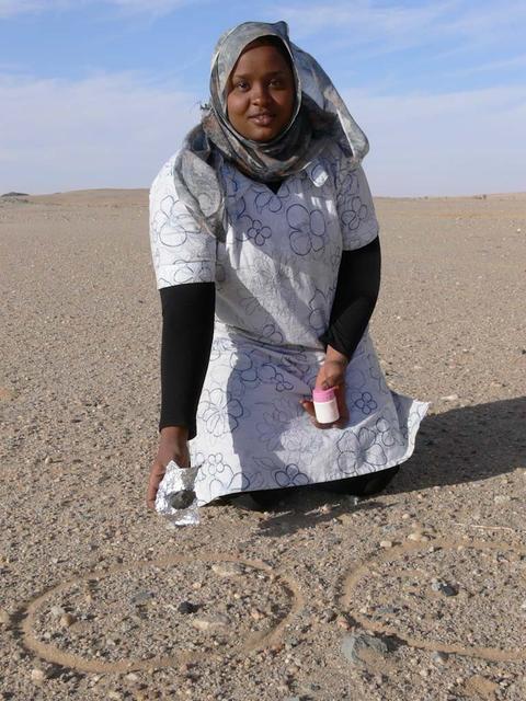An SUV-sized Asteroid 2008TC# Impacts on October 7, 2008 in the Nubian Desert, Northern Sudan: Dr. Peter Jenniskens, NASA/SETI joined Muawia Shaddas of the University of Khartoum in leading an expedition on a search for samples. (emteorite 3rd-three found) Photo Credit: NASA/SETI/P. Jenniskens