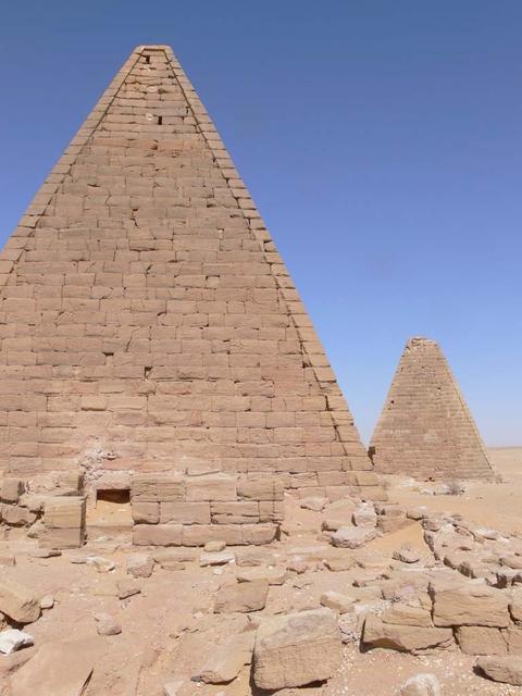 An SUV-sized Asteroid 2008TC# Impacts on October 7, 2008 in the Nubian Desert, Northern Sudan: Dr. Peter Jenniskens, NASA/SETI joined Muawia Shaddas of the University of Khartoum in leading an expedition on a search for samples. Pyramid pair Photo Credit: NASA/SETI/P. Jenniskens