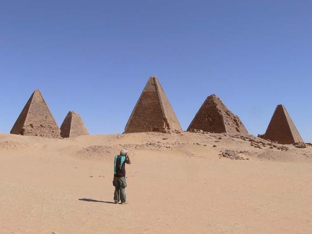 An SUV-sized Asteroid 2008TC# Impacts on October 7, 2008 in the Nubian Desert, Northern Sudan: Dr. Peter Jenniskens, NASA/SETI joined Muawia Shaddas of the University of Khartoum in leading an expedition on a search for samples. Pyramids Photo Credit: NASA/SETI/P. Jenniskens