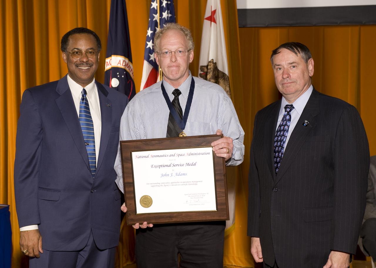 NASA Honor Awards and Presidential Rank Awards: Exceptional Service Medal to John J. Adams.