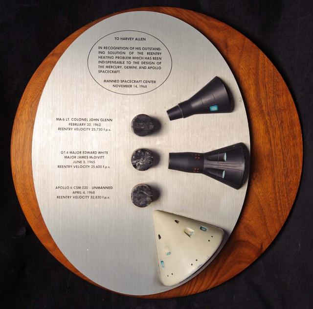 A plaque presented to Harvey Allen in recognition of his outstanding solution of the reentry heating problem which has been indispensable to the design of the Mercury, Gemini, and Apollo spacecraft  (Manned Spacecraft Center, November 14, 1968) Plaque contains samples of tested materials and models of spacecraft.